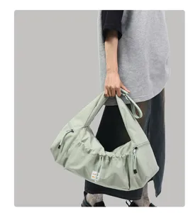 Large capacity crossbody bag for women, casual commuter shoulder bag with multi pockets and zip.