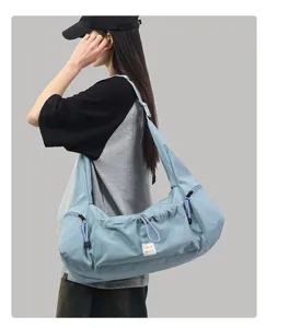 Casual large capacity crossbody shoulder bag for daily commuting and sports fitness.