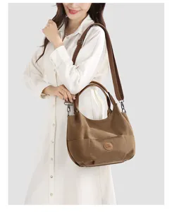 Stylish canvas shoulder bag for women, large capacity casual tote and crossbody handbag.