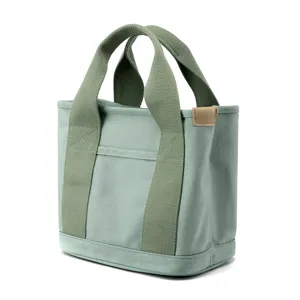 Casual green canvas tote bag for women, stylish small handbag with top handles for daily use.