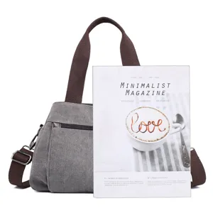 Casual grey canvas handbag for women, versatile daily shoulder and crossbody bag with brown straps.