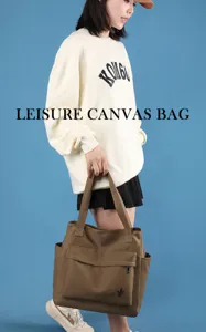 Casual canvas tote bag with large capacity, front pocket, and durable shoulder straps.