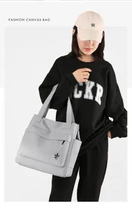 Casual gray canvas tote bag for women, large capacity shoulder bag with multi pockets.