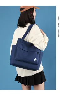 New minimalist canvas shoulder bag for women, large capacity casual tote bag for daily commute.