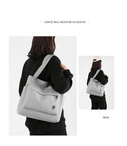 Casual grey canvas shoulder bag for women, large capacity minimalist tote and handbag.