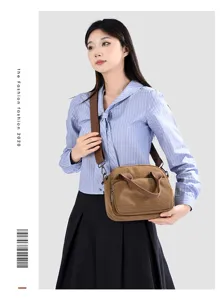 Korean style minimalist casual canvas crossbody bag for women, versatile brown shell shoulder bag.