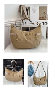 Detailed view of casual nylon crescent crossbody bag with multiple zipper pockets for daily use.
