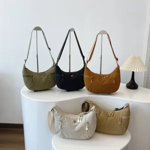 Casual nylon crossbody shoulder bag for women, trendy multi-color dumpling crescent handbag.