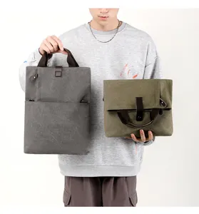 Versatile canvas men's shoulder bag casual multi-functional crossbody travel handbag.