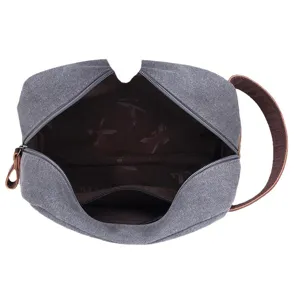 Sac de toilette en toile grise vue ouverte avec compartiment interieur poignee