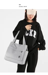 Korean style minimalist large capacity canvas shoulder bag for women, casual daily tote design.