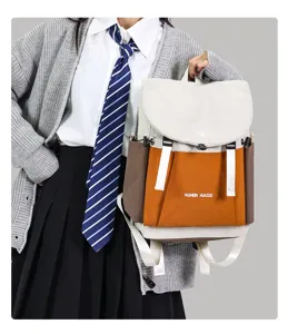 Casual student canvas backpack with multi-pocket design, stylish color-blocking daily daypack.