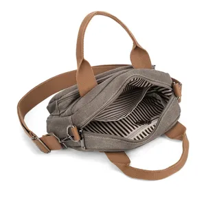 Casual canvas crossbody bag for women with contrast color top handles and striped interior.