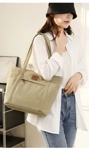 Casual canvas shoulder bag for women, large capacity daily tote, stylish minimalist design.