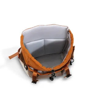 Casual color-block backpack with drawstring closure and compartments for daily use.