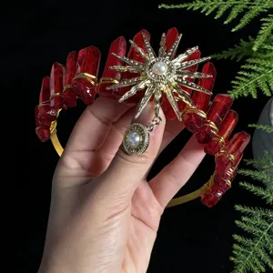 Stunning red crystal crown headband with gold sunburst pearl pendant for chic fashion women.