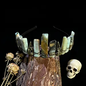 Detailed view of gothic crystal raw stone crown headband with raven skull alloy accessories.
