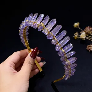 Close-up detail of the handmade purple quartz crystal crown headband with delicate gold wire wrap.