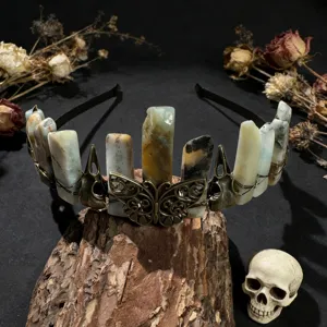 Natural crystal crown headband with gothic butterfly skull design, perfect for edgy fashion photography.