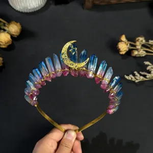 Close-up detail of the crystal crown headband featuring a golden star and moon charm wire.