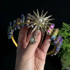 Gorgeous sun goddess crystal crown headband with raw titanium quartz and pearl details for women.