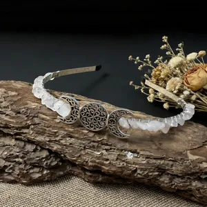 Close-up detail of the natural crystal chip triple moon headband, handcrafted boho style.