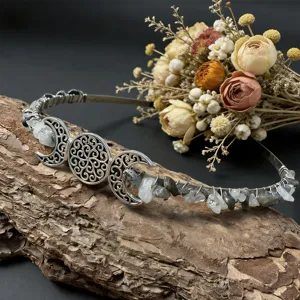 Close-up detail shot of the handmade crystal moon tiara, showing exquisite wire wrapping.