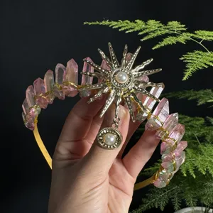 Detailed shot of natural crystal crown headband with stunning sun goddess pearl charms.