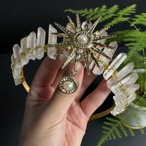 Exquisite details of the golden sun goddess crystal tiara, featuring raw quartz and pearl pendant.