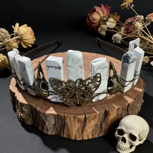 Gothic natural white crystal headband with butterfly and raven skull for photography.