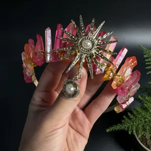 Detail view of the crystal sun goddess crown headband, showing raw quartz and gold metal.