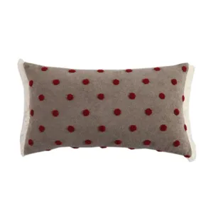Boho style rectangular lumbar throw pillow cover with red tufted dots and fringe edges.