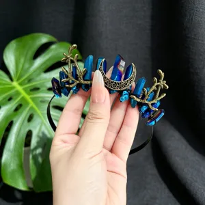 Blue crystal crescent moon branch crown headband detail shot, elegant goddess hair accessory.