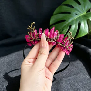 Close-up detail of the pink crystal moon branch hairband, exquisite handmade crown.