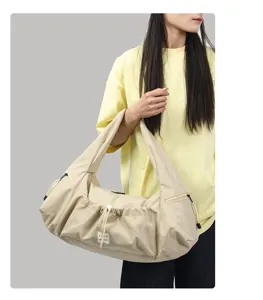 Large capacity beige shoulder bag casual hobo tote bag for daily commute and outdoor travel.
