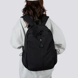 Casual lightweight black backpack for students, travel, school and daily commuter use