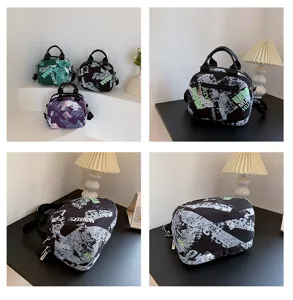 Stylish graffiti printed canvas handbag, versatile crossbody tote bag with large capacity.
