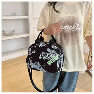Detailed view of stylish graffiti canvas crossbody shoulder bag with spacious daily capacity.
