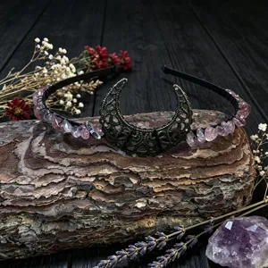 Handcrafted crystal crescent moon headband featuring pink gemstone chips and metal details.