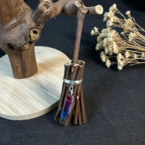 Small wooden magic witch broom decoration with crystal pendant for home display