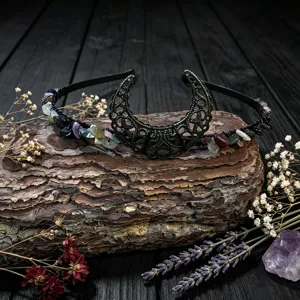 Handmade crystal crescent moon headband featuring mixed natural stone chips on a black band.