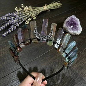 Crystal quartz crown headband detail with raw stone spikes and silver moon motif for styling.