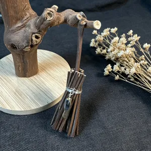 Mini witch broom crystal pendant ornament, natural twig handmade Halloween decor detail.