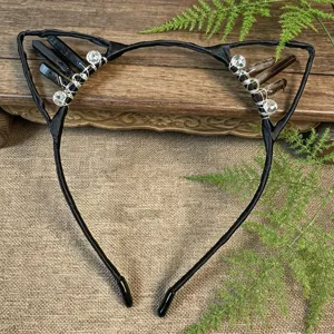 Handcrafted crystal cat ears headband detail view, black hair hoop with natural stones.
