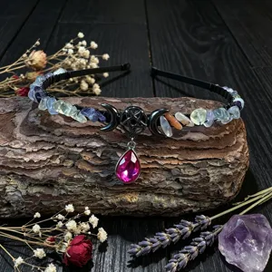 Detailed close-up of a Gothic crystal moon pentagram headband with colorful natural stone chips.