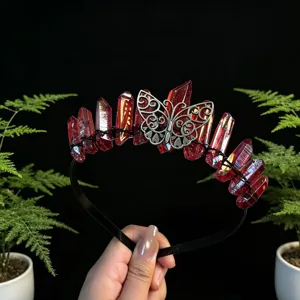 Red crystal tiara headband featuring a silver butterfly design, perfect for festival wear.