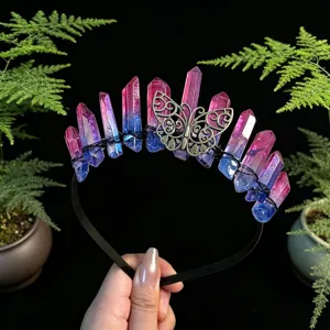 Detailed view of the handmade crystal crown headband featuring pink and blue quartz and a butterfly.