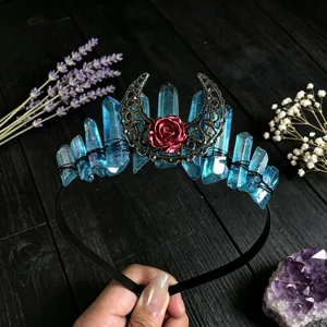 Crystal tiara crown featuring blue quartz clusters, metal crescent moon and red rose for women.