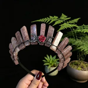 Close-up of crystal crown headband with raw stones and triple moon gothic hair accessory.