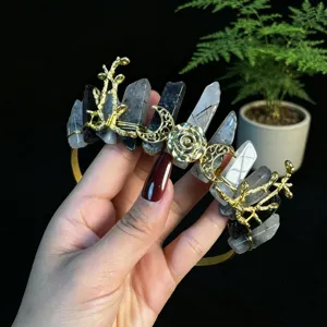 Crystal crown detail shot showing the natural quartz and gold metal moon flower branch design.